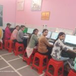 girls learning free basic computing
